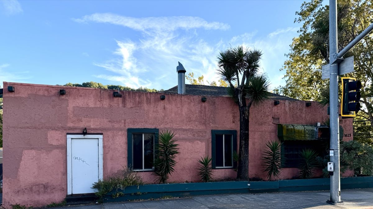 The long empty pink stucco building on Sir Francis Drake that was Pancho Villa, its door sealed and weeds growing at the base of the wall.