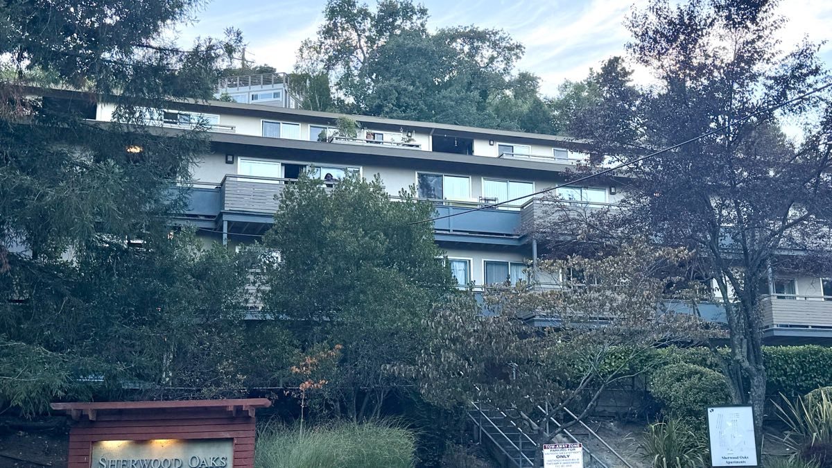 Sherwood Oaks Apartments on Bolinas Road, a three-story block stepped back into the hillside.